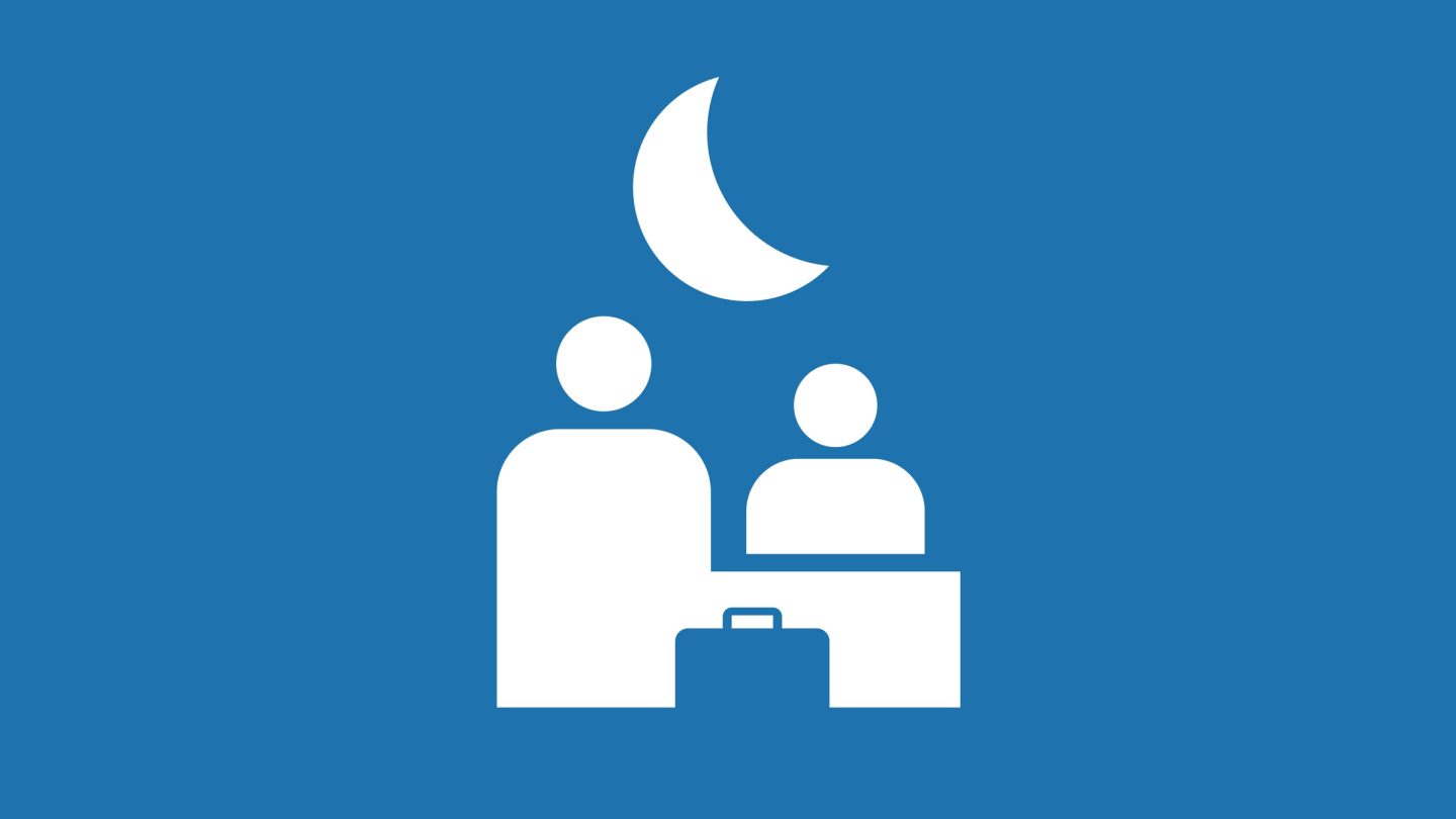 Illustration of a check-in desk with a moon above it