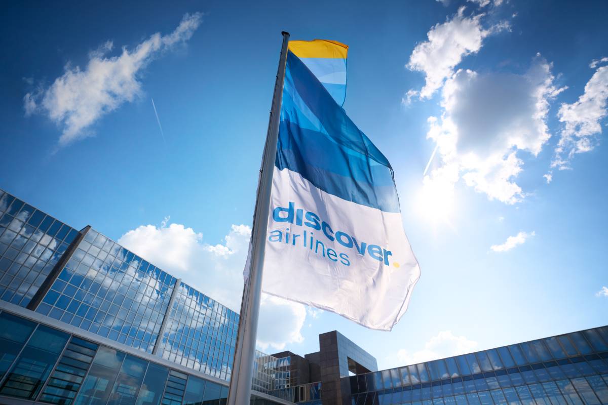 Discover Airlines flag in front of Terminal 1 at Frankfurt Airport