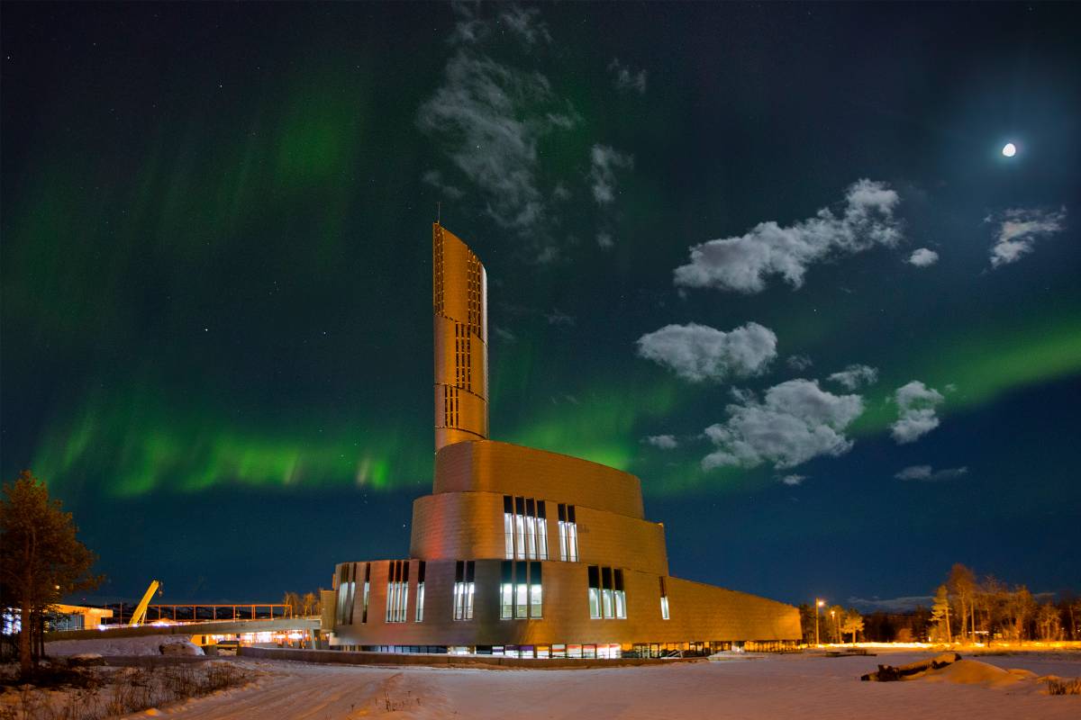 Northern lights can be seen in the sky above the cathedral