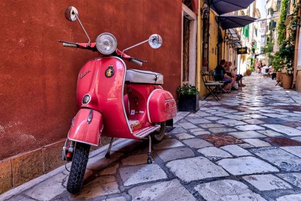 Red scooter in the old town of Corfu