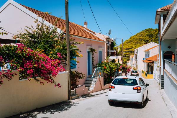 Rental car in front of a small house in Ibiza